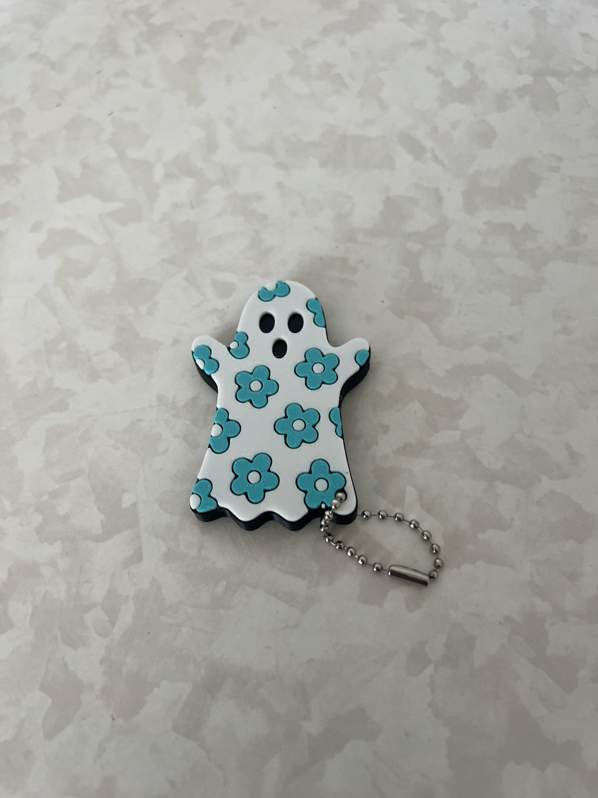 Ghost With Teal Flowers Nail Saver