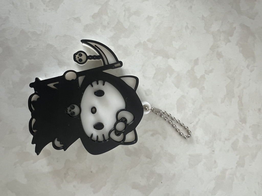 Hello Kitty Grim Reaper Nail Saver